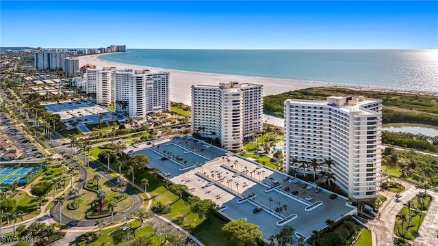 bird's eye view featuring a beach view and a water view