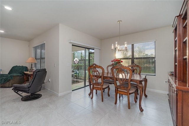 dining area with a chandelier