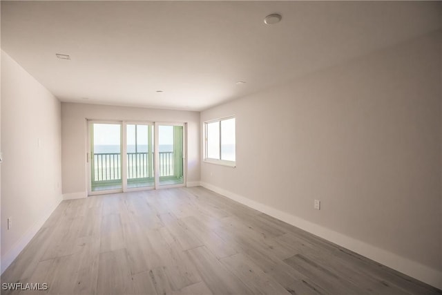 empty room featuring light hardwood / wood-style floors