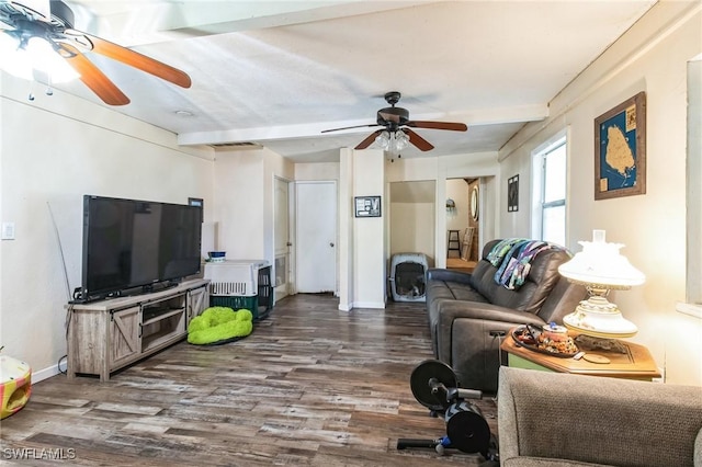 living room featuring beam ceiling and wood-type flooring