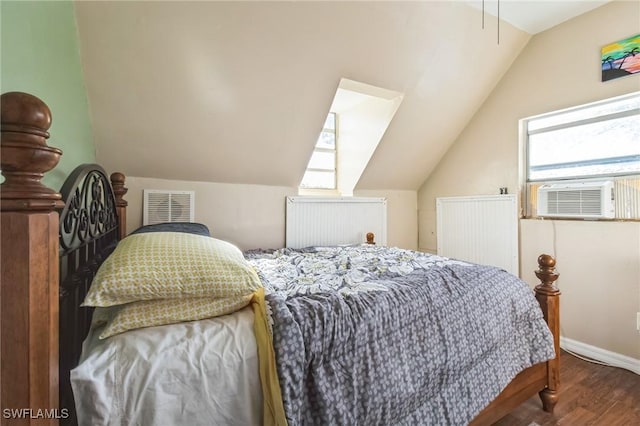 bedroom with hardwood / wood-style flooring, cooling unit, and lofted ceiling