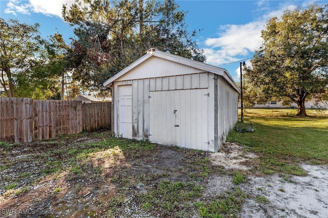 view of outdoor structure with a yard