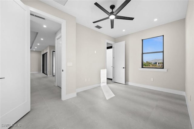 unfurnished bedroom featuring ceiling fan