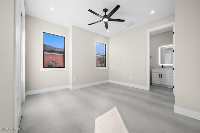 unfurnished room featuring ceiling fan