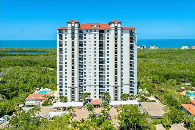 view of building exterior with a water view