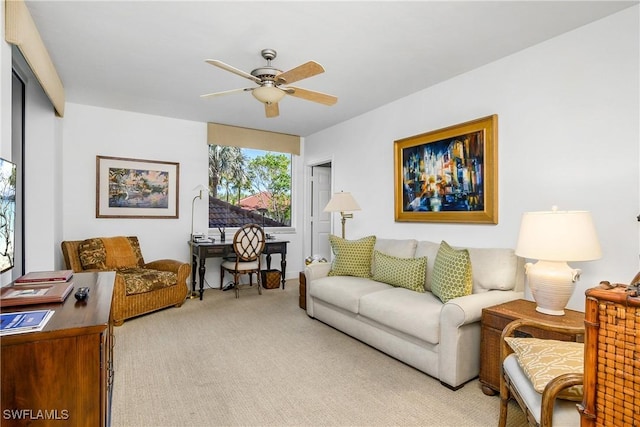 7225 Pelican Bay Blvd Unit 203, Naples, FL 34108 - carpeted living area featuring a ceiling fan