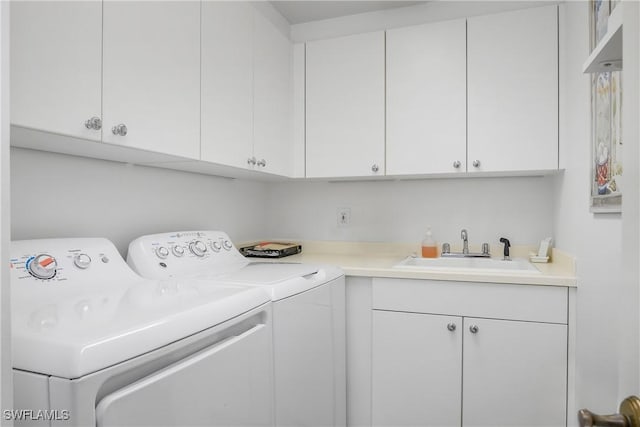 7225 Pelican Bay Blvd Unit 203, Naples, FL 34108 - laundry room with independent washer and dryer and cabinet space