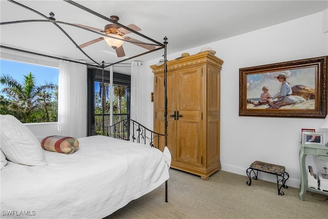 7225 Pelican Bay Blvd Unit 203, Naples, FL 34108 - bedroom featuring light colored carpet, access to outside, baseboards, and a ceiling fan