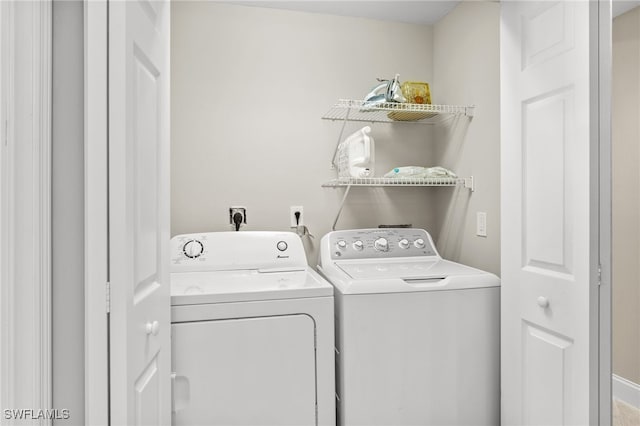 11021 Gulf Reflections Dr Unit 103, Fort Myers, FL 33908 - laundry area featuring laundry area and washer and clothes dryer