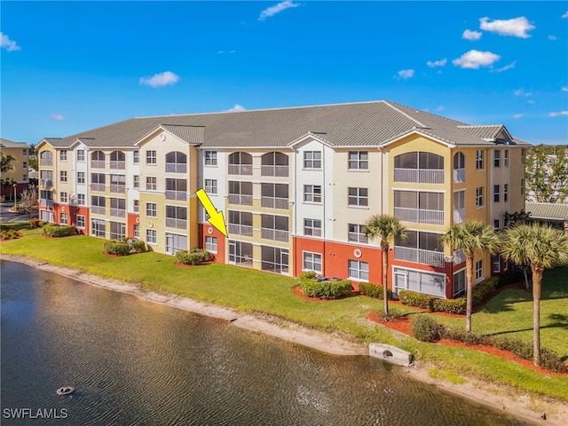 view of building exterior featuring a water view