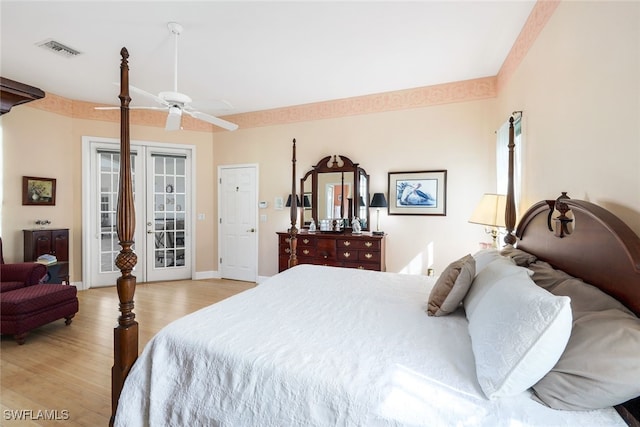 bedroom featuring access to outside, ceiling fan, and light hardwood / wood-style floors