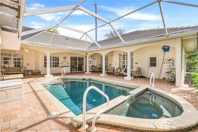 view of swimming pool featuring a patio area, an outdoor hangout area, and an in ground hot tub