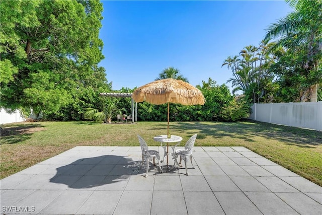 view of patio / terrace with fence