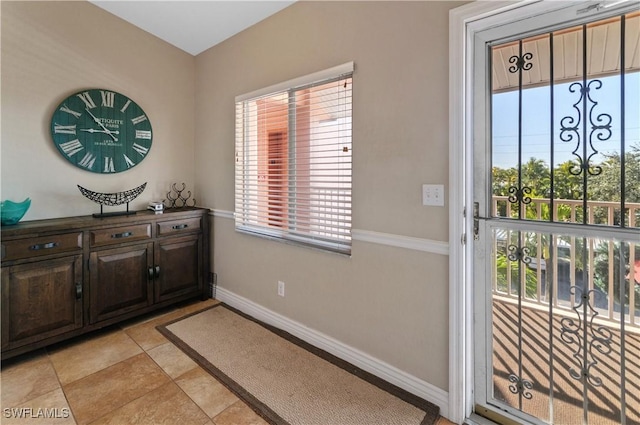 entryway featuring light tile patterned flooring