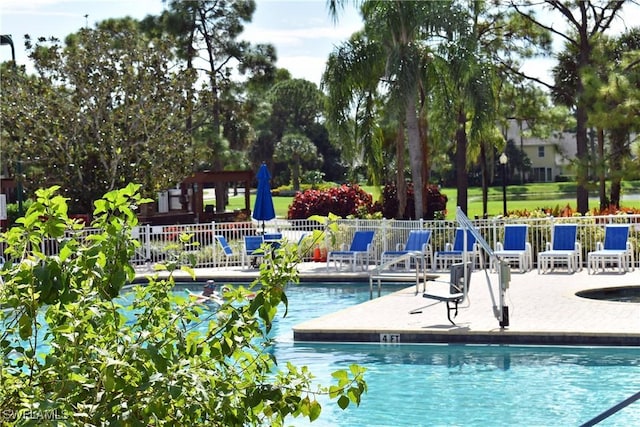 view of swimming pool featuring a patio