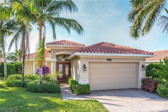 mediterranean / spanish-style home featuring french doors