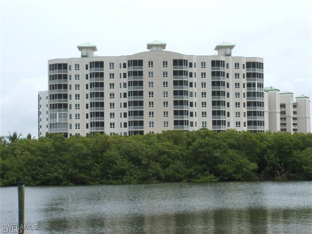 view of building exterior with a water view