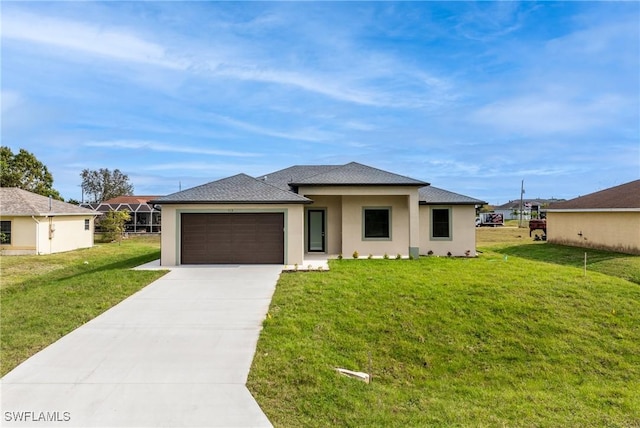 view of front facade featuring a front yard and a garage