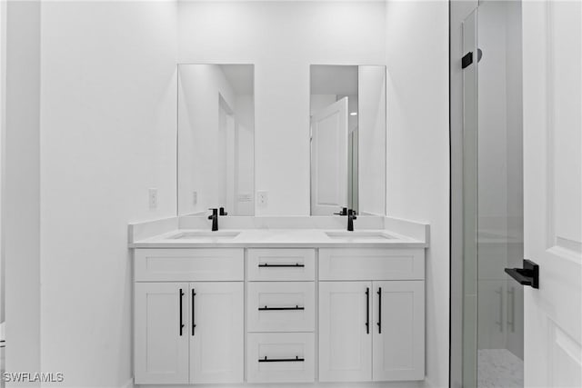 bathroom with vanity and walk in shower