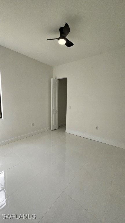 unfurnished room featuring ceiling fan