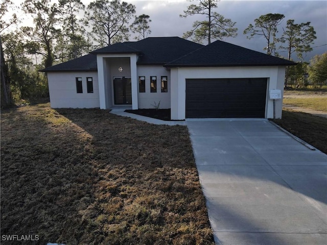 prairie-style house with a garage