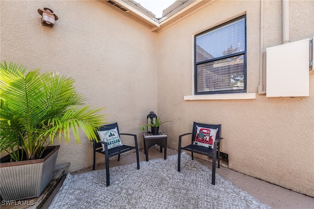 exterior space with vaulted ceiling