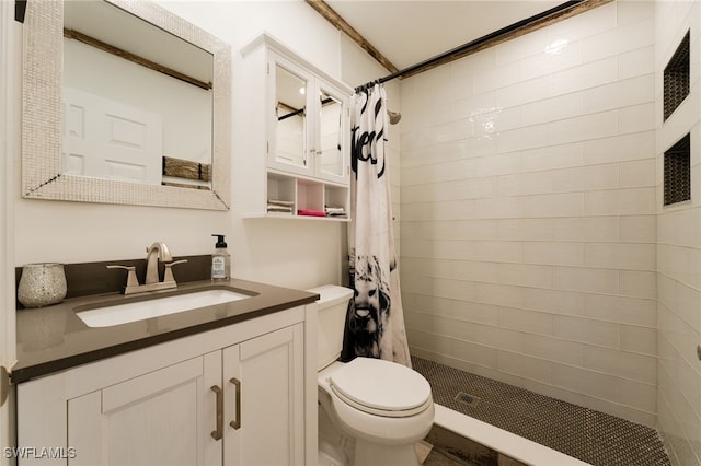 bathroom with a shower with curtain, toilet, and vanity