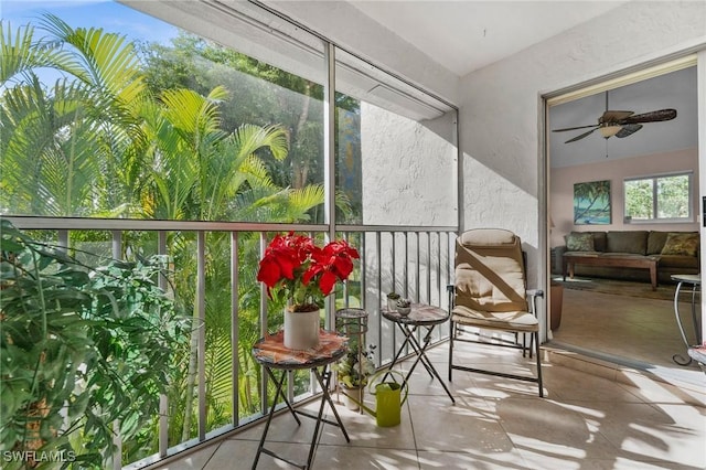 balcony featuring ceiling fan