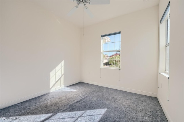 empty room with carpet flooring and ceiling fan