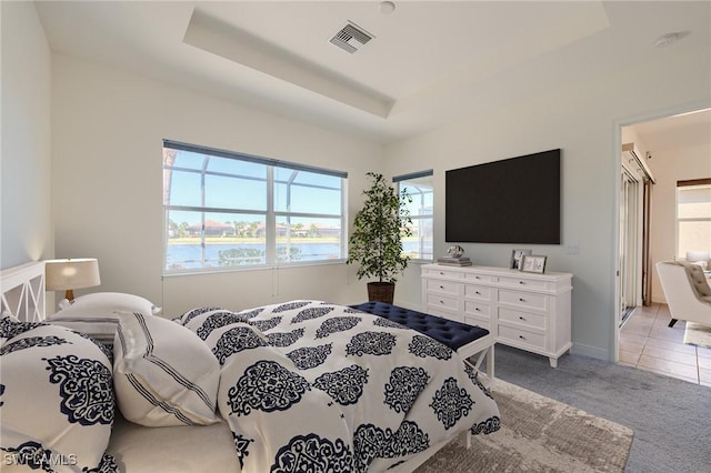 bedroom with light carpet