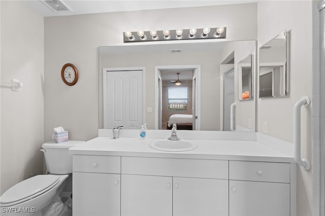 ensuite bathroom with vanity, visible vents, toilet, and ensuite bathroom