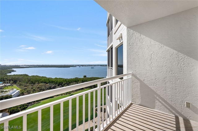 balcony featuring a water view