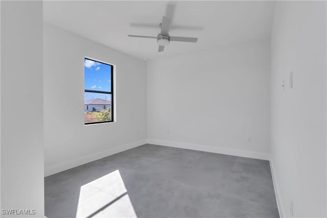 unfurnished room featuring concrete floors and ceiling fan