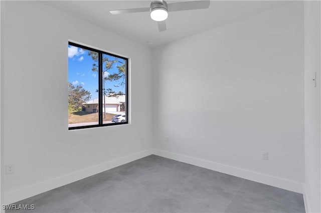 spare room featuring ceiling fan