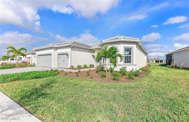 view of front of house with a garage and a front yard