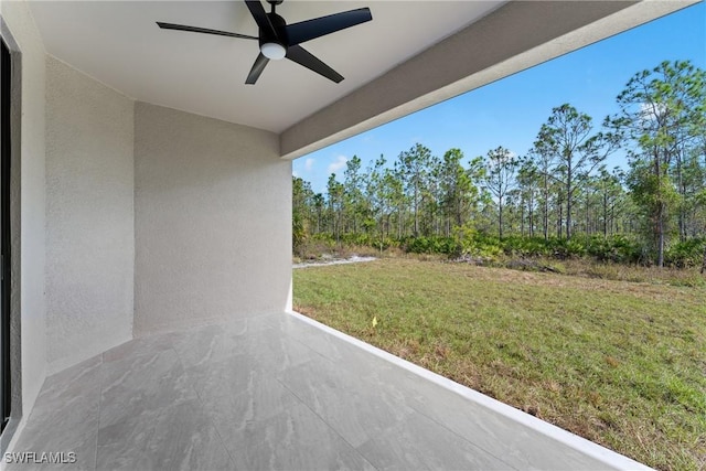 view of patio / terrace featuring ceiling fan