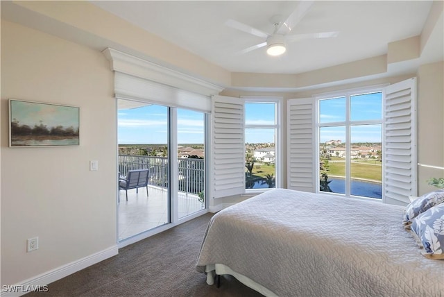 carpeted bedroom featuring access to outside and ceiling fan