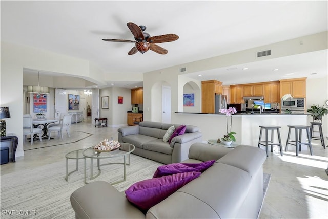 living room with ceiling fan