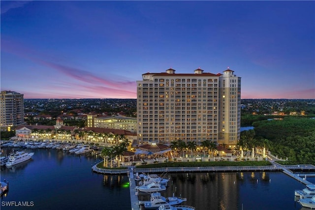 aerial view at dusk with a water view