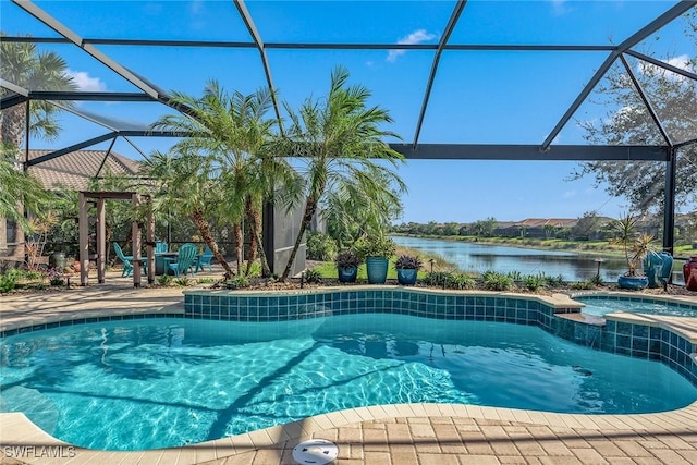 view of swimming pool featuring a water view, a patio area, and a lanai