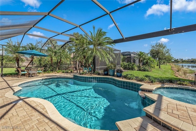 view of swimming pool featuring glass enclosure, an in ground hot tub, and a patio