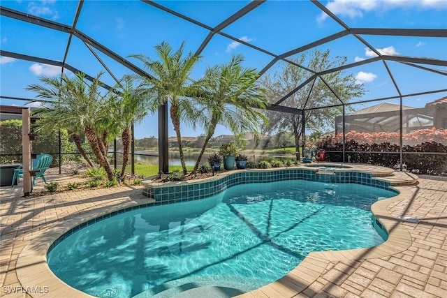 view of swimming pool with a lanai, a water view, and a patio