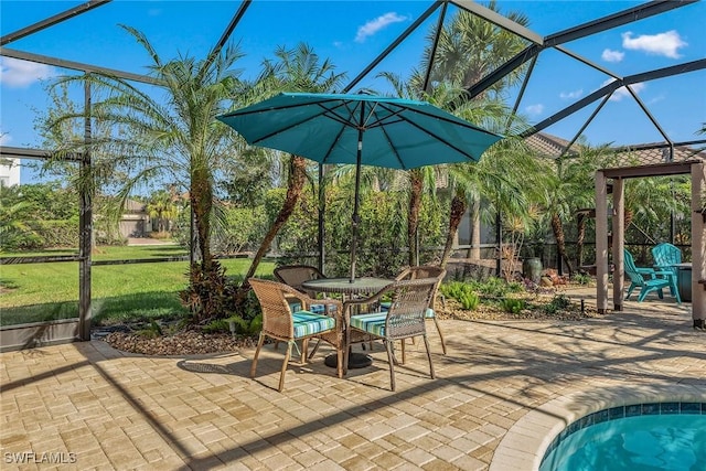 view of patio featuring a lanai