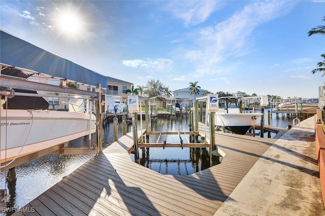 dock area with a water view