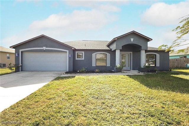 ranch-style house with central AC unit, a garage, and a front lawn