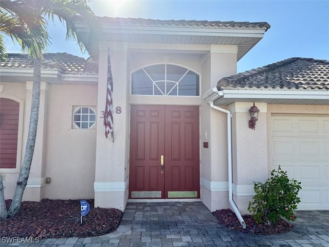 property entrance featuring a garage