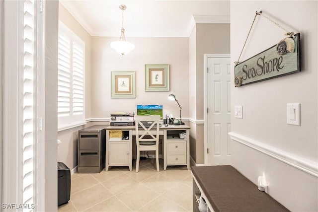 office space with crown molding and light tile patterned floors