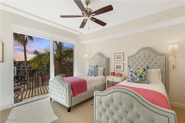 carpeted bedroom with ceiling fan, baseboards, and access to exterior