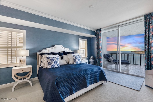 carpeted bedroom featuring wallpapered walls, baseboards, access to exterior, and ornamental molding