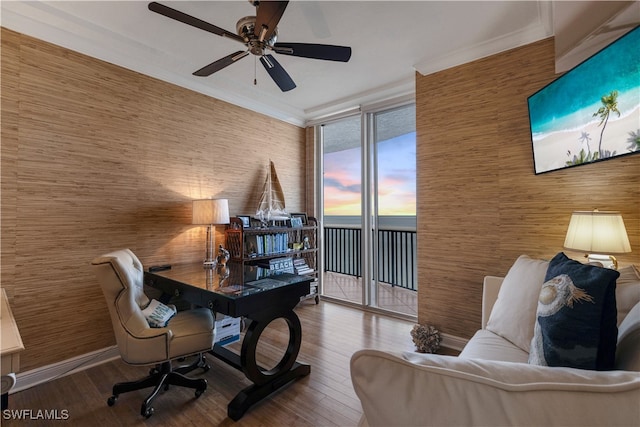 home office with wood finished floors, baseboards, and ornamental molding